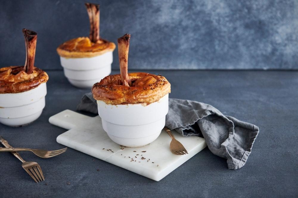 A winter favourite, this saucy lamb shank pot pie is absolutely delicious. Lamb shanks, vegetables, red wine, herbs and tomatoes are combined with Chorizo and topped with crisp, flaky puff pastry to create a visually stunning dish that tastes even better than it looks.