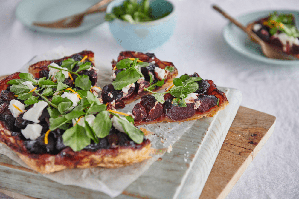 Sticky-sweet, earthy roasted beetroot is combined with a delicious mix of shallots, balsamic vinegar, brown sugar, and juniper berries, all wrapped up in butter puff pastry to create this upside-down tarte tatin. Topped off with citrus, fresh goat’s cheese, lemon thyme and watercress, this gorgeous dish can be served hot or cold, making it perfect for Boxing Day leftovers!